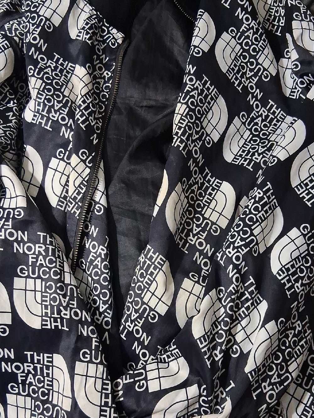 The North Face Gucci Black and White Allover Logo Bomber Jacket